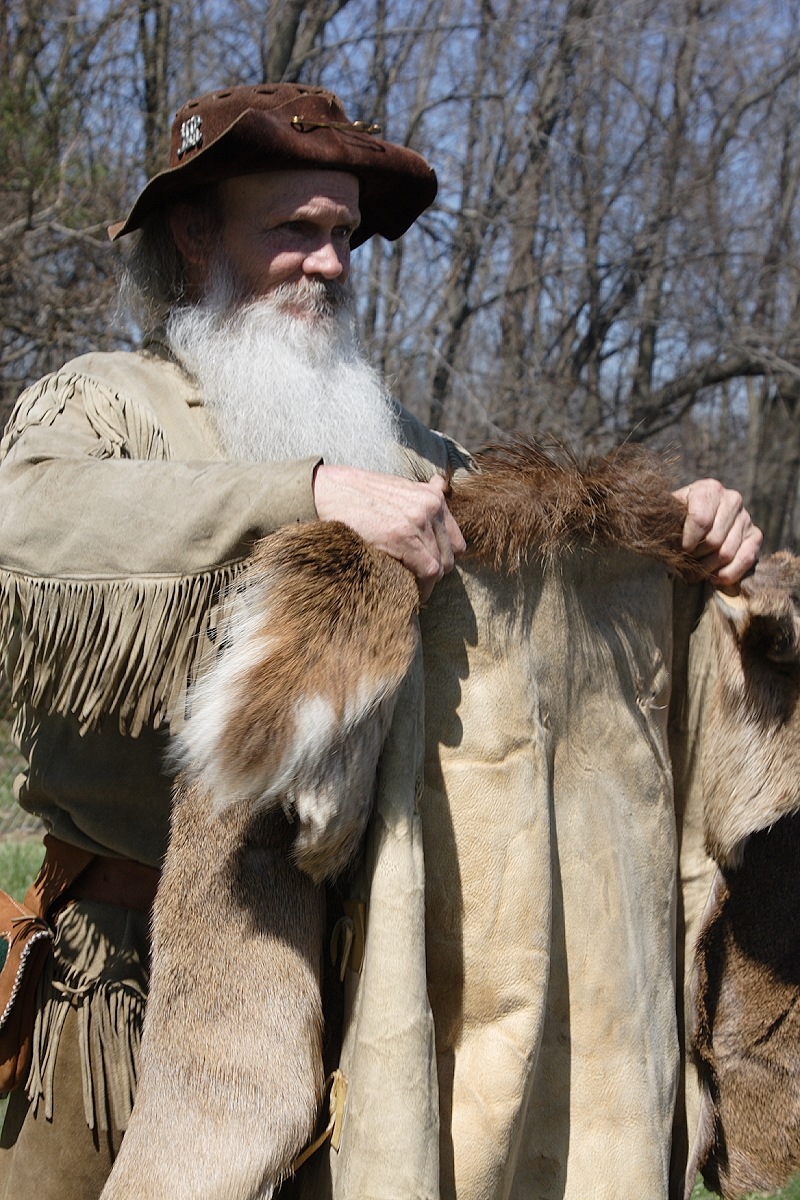 Period buckskin clothing, leather possibles bag, and frontier kit on display, representative of the late 19th-century Western working dress Horn and his contemporaries wore in Wyoming's range-war years.