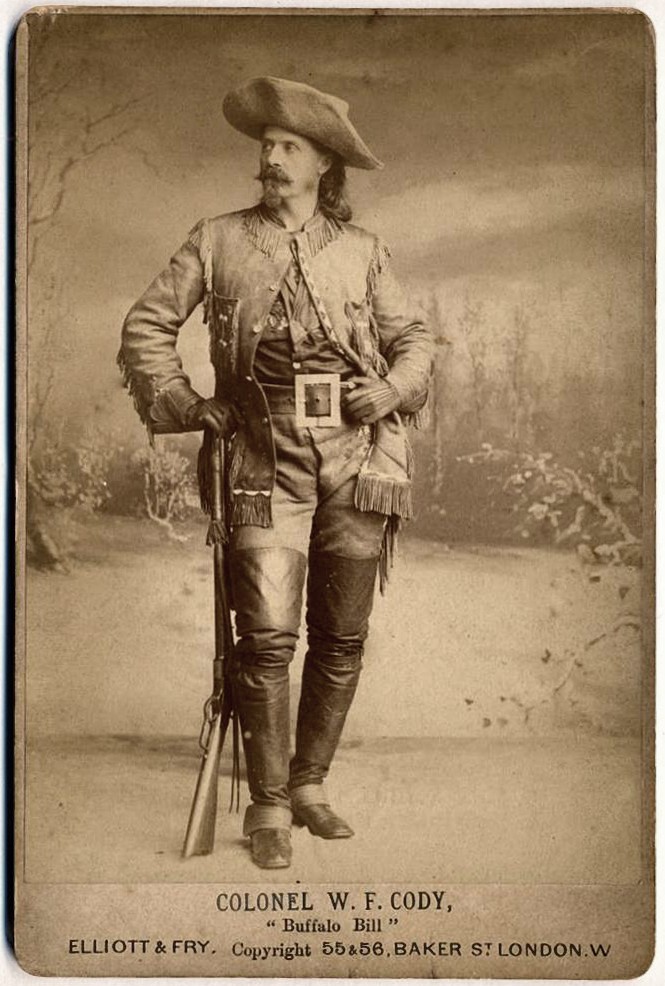 Studio portrait of Buffalo Bill Cody in formal Western attire, c.1880, during his theater touring years.