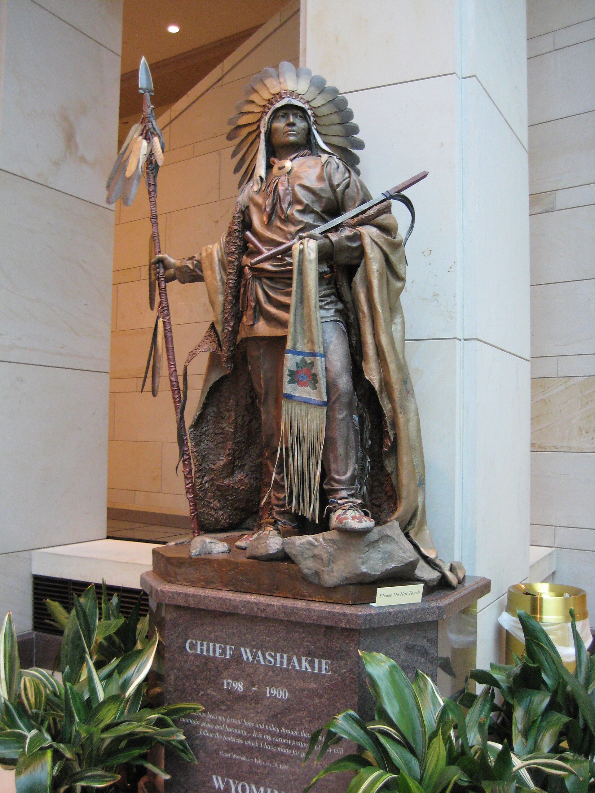 Bronze statue of Chief Washakie of the Eastern Shoshone, standing in regalia with one hand raised.