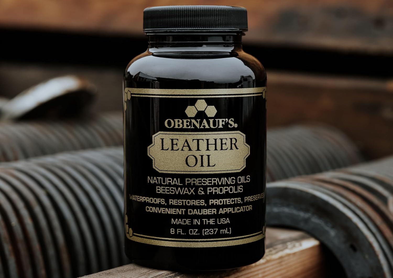 Obenauf's Heavy Duty LP 8 oz tin, showing the product label with beeswax and propolis formula information
